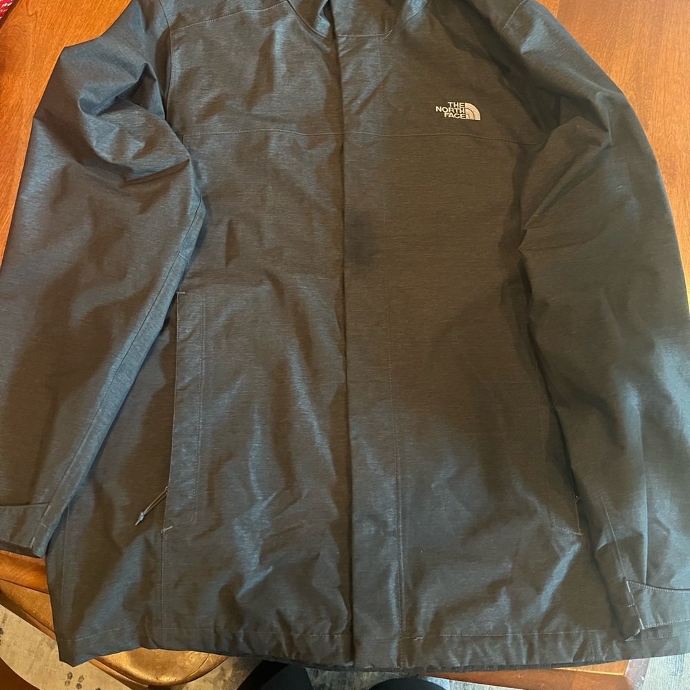 Men’s North Face dark gray rain jacket